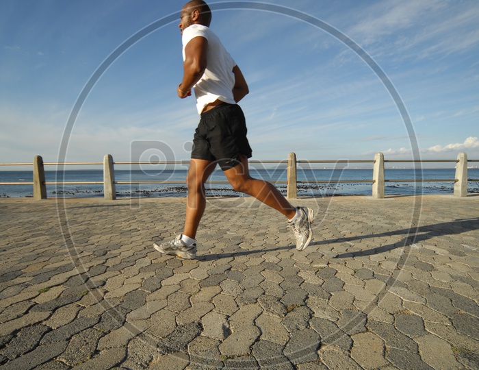 Man jogging by the river