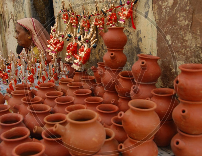 Old Women with Pots in the foreground
