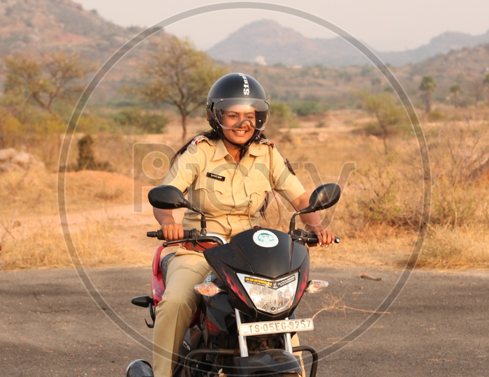 Female Police Officer of maharastra Police Riding a Bike