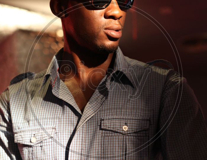African man wearing sunglasses