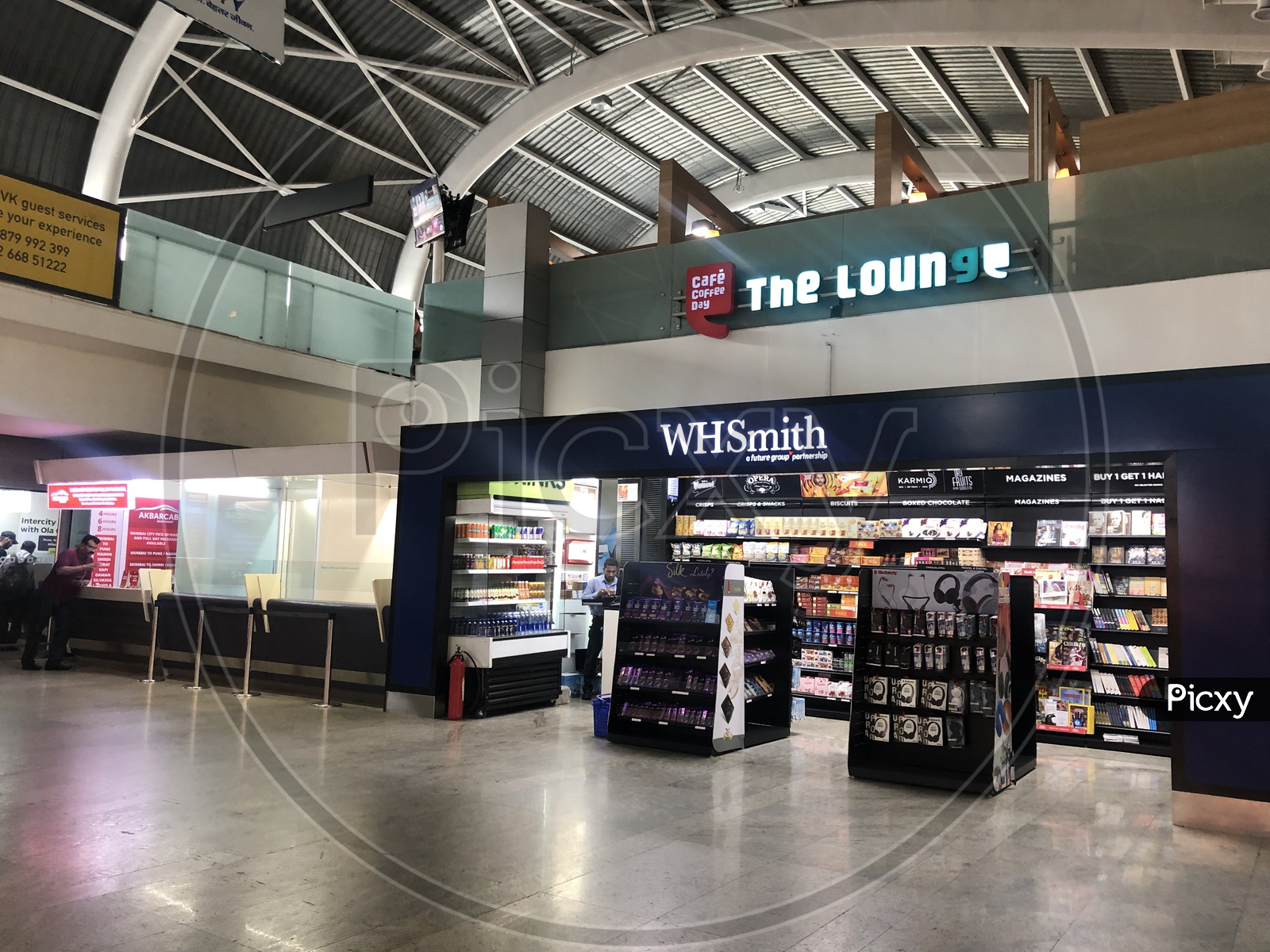 Image of Cafe coffee Day Lounge and WHSmith Shops in Mumbai Airport