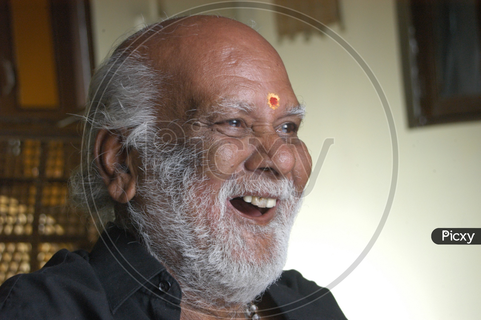 Photograph of a old men / People Face / Smiling Face