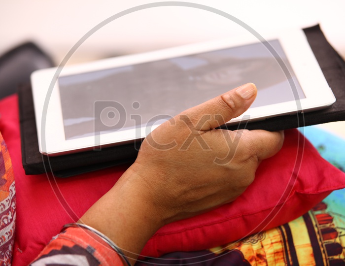 Tablet / Tab in Woman's Hand