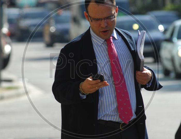 A Man On Streets of Europe With phone