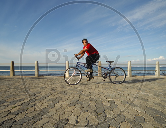 Man Uni-cycling