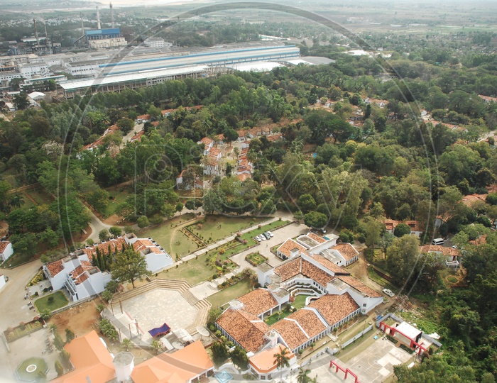 Aerial View of an Industry / Factory With village in the foreground