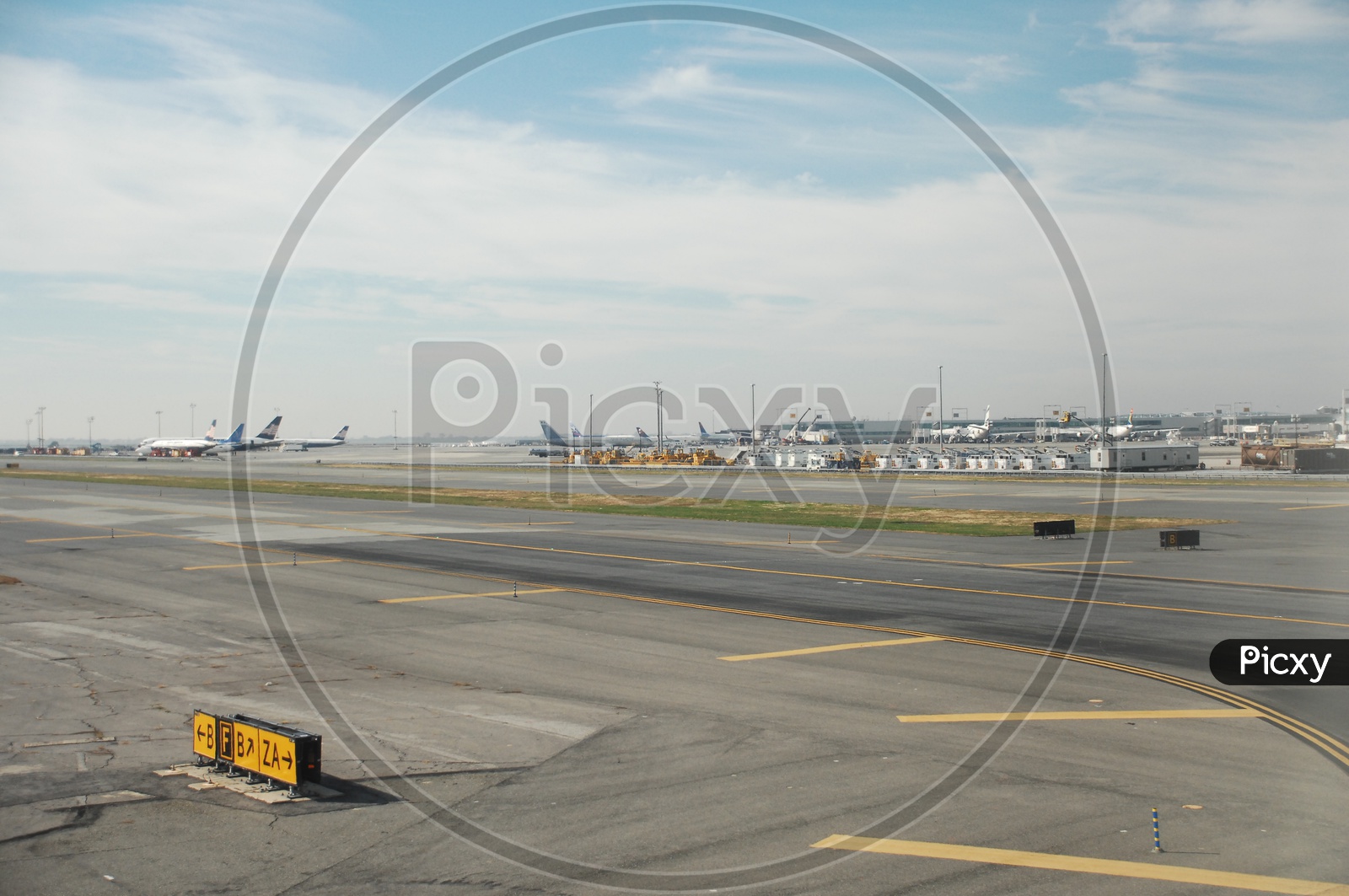 Flights waiting on runway captured from flight window
