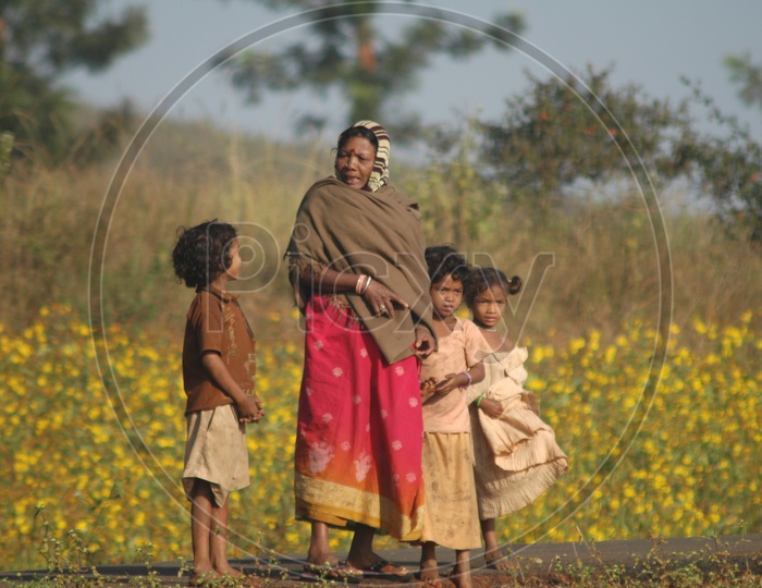 Tribal Woman With Children