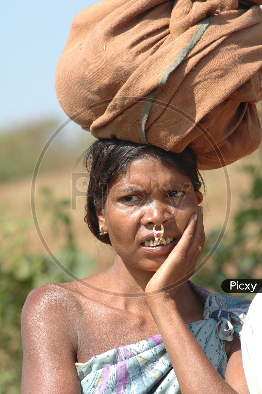 Tribal Woman in Villages With Weights On Head
