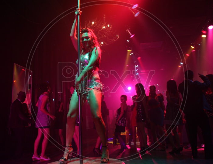 A girl/woman dancing in the pug/Pole dance - Movie Still