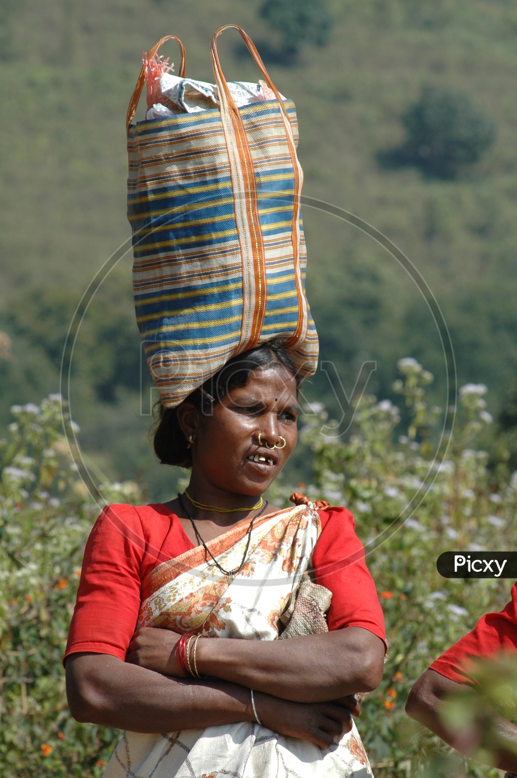 Tribal Woman in Villages With Weights On Head