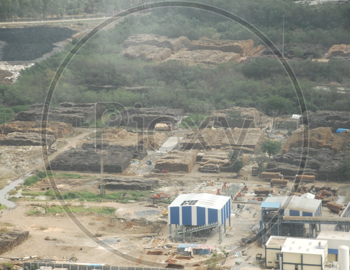 An Aerial View Of Industrial area in hyderabad  with Godown and houses  from Flight Window