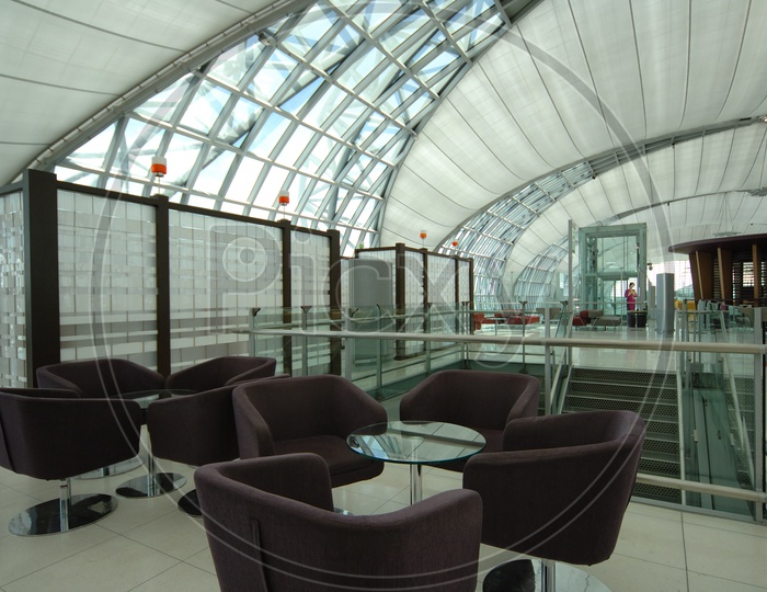 Waiting Lounge In Airports With Passengers Showing a Travel Scene