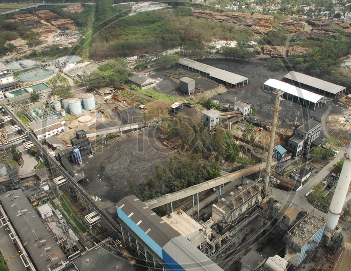 Aerial View of a Factory with Exhaust Pipes