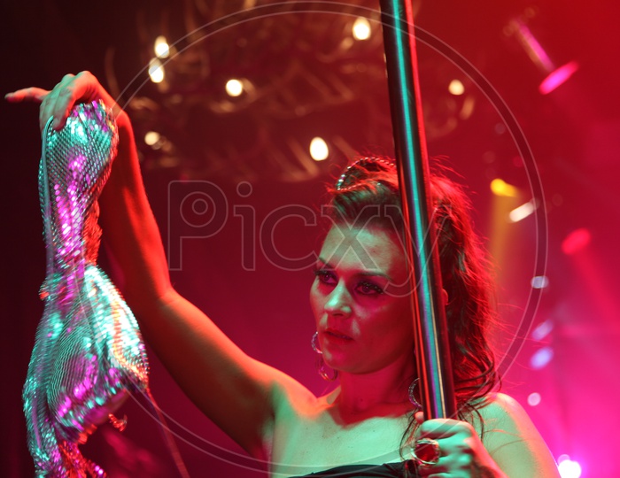 A girl/woman dancing in the pug/Pole dance - Movie Still