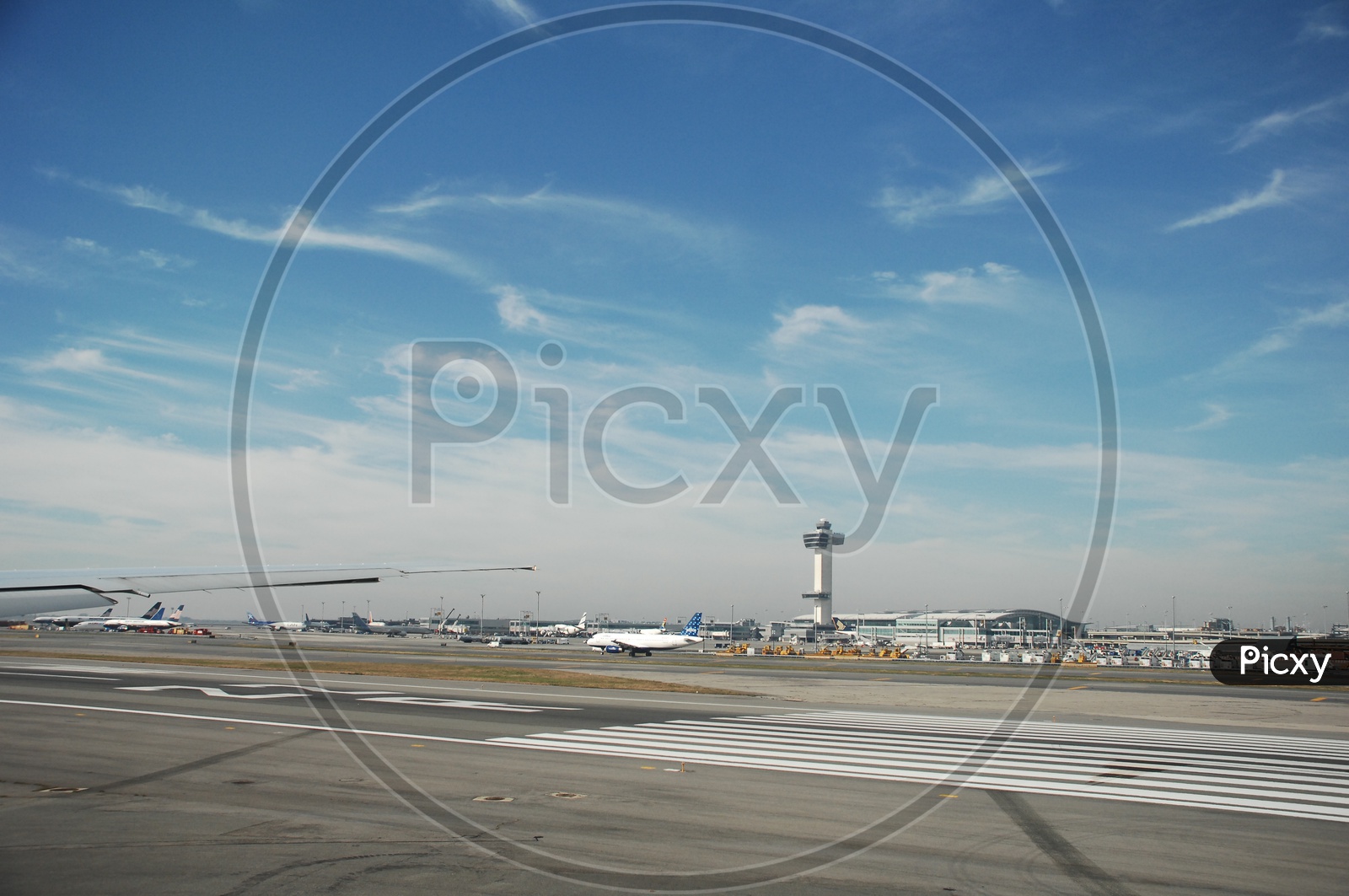 Flights waiting on runway captured from flight window