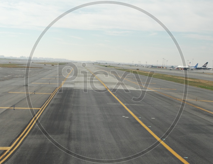 Airport runway captured from flight window