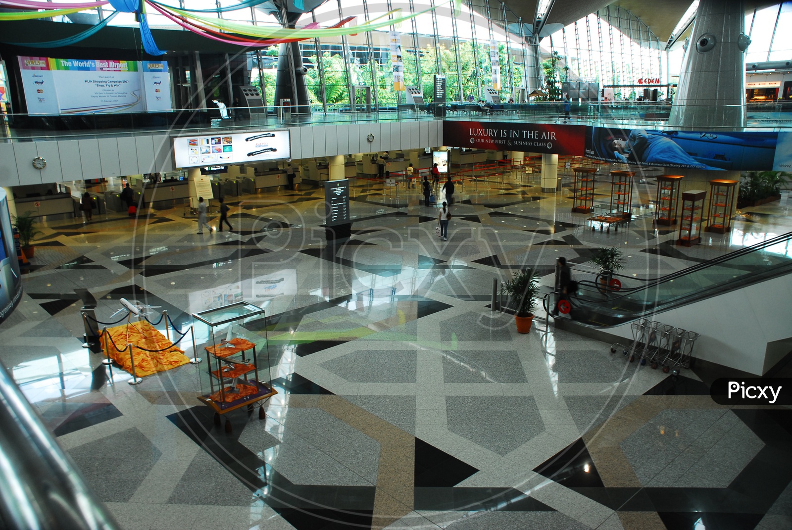 Airline Passengers in an Airport Terminal For Travel Concept