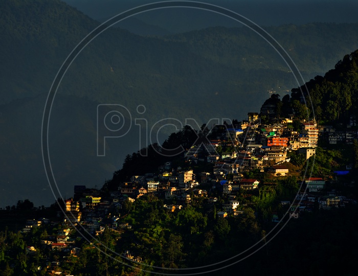 A Beautiful View Of a Houses In Hill station In Night Time