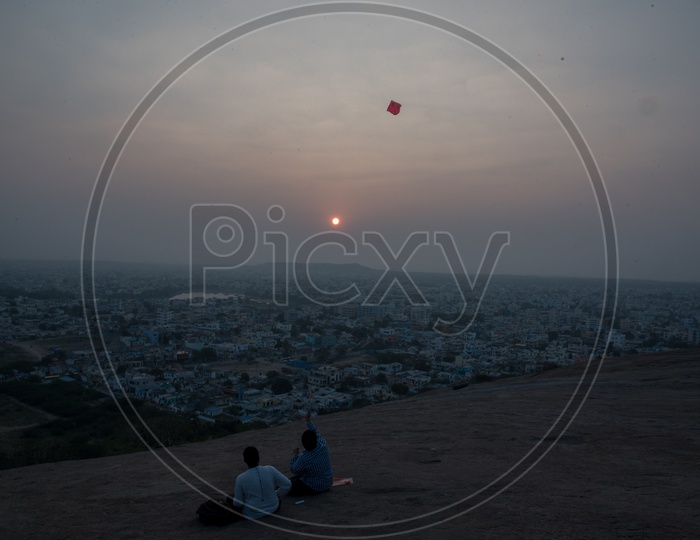 People Flying  Kites On a Hill Top in  Pushkar City