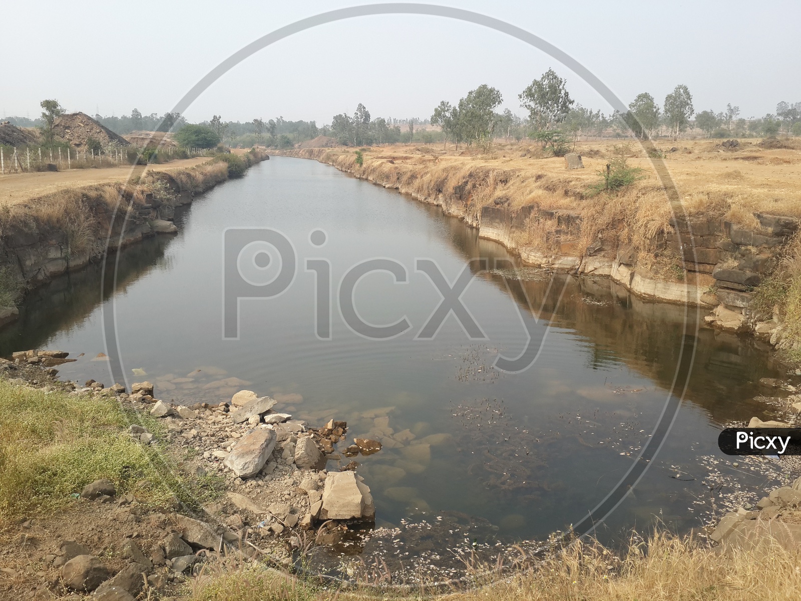 A Water Channel / Canal   In Indian Villages with Water in it