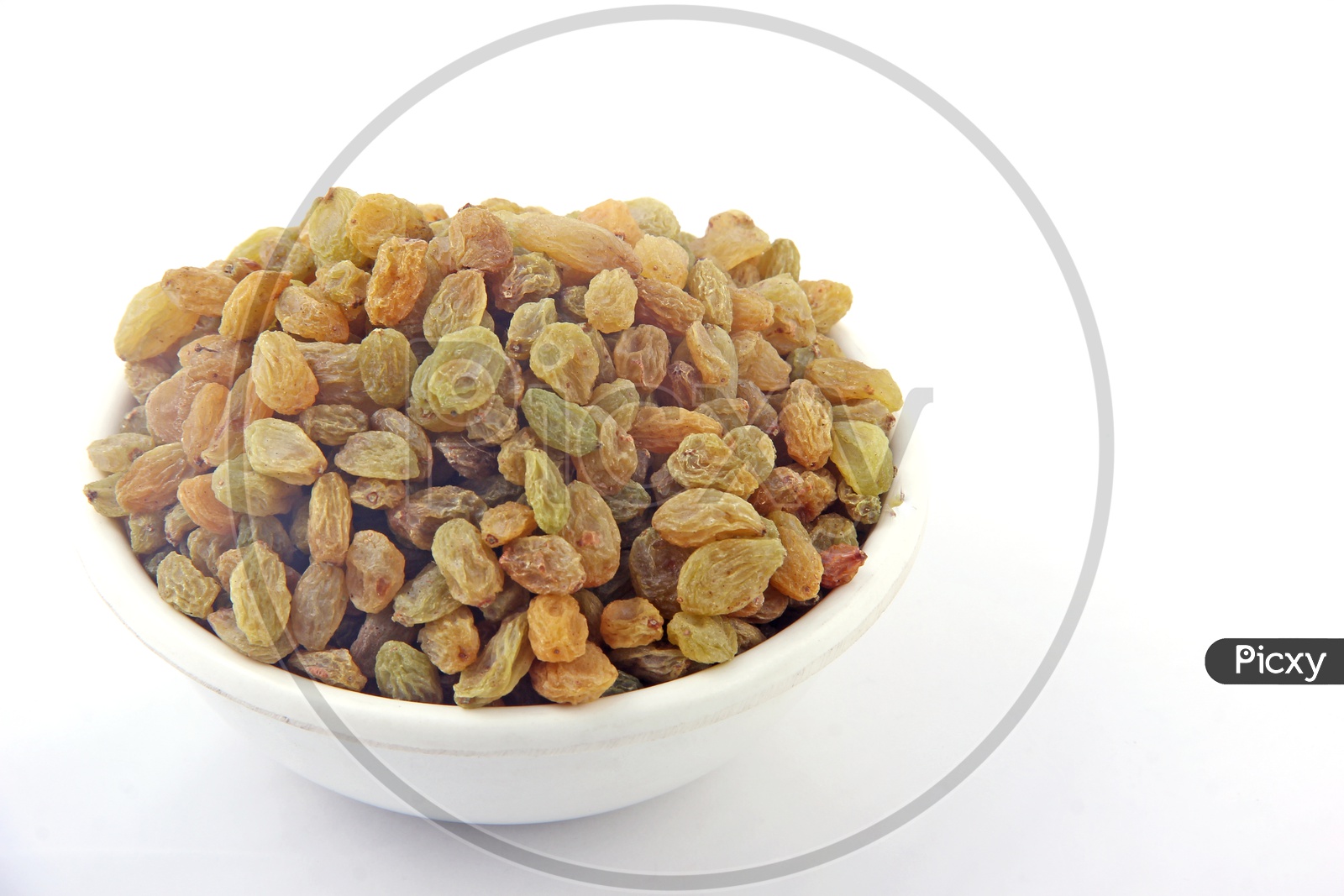 Bowl of Raisins / raisins in a Bowl isolated on a White Background