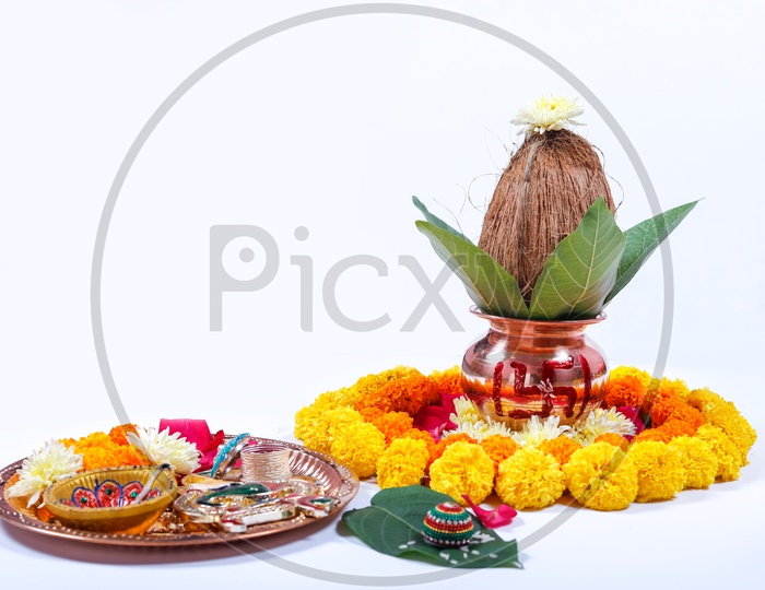 Kalisam & Pooja Talli decorated with Marigold Flower for Pooja. Indian traditions/rituals