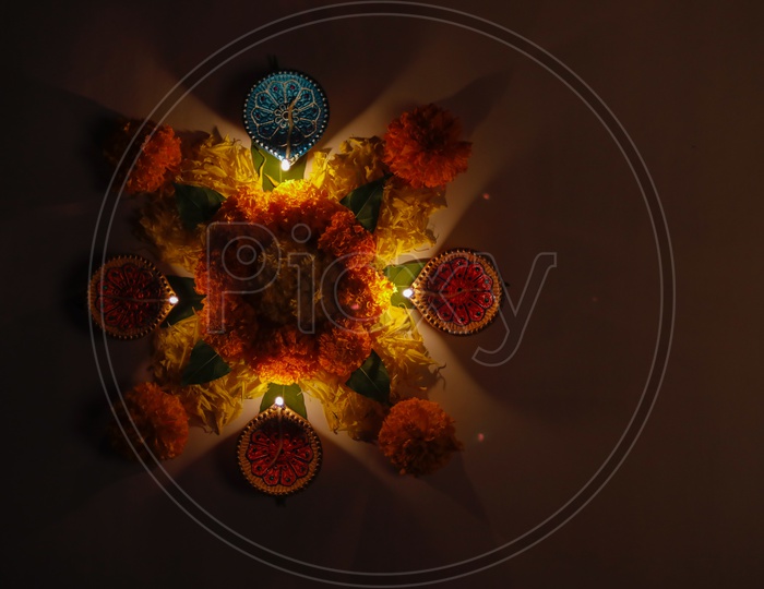 Marigold Flower Rangoli Design for Diwali, Deepavali or Dipavali Festival