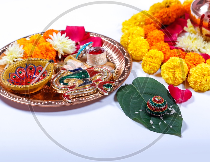 Kalisam & Pooja Talli decorated with Marigold Flower for Pooja. Indian traditions/rituals
