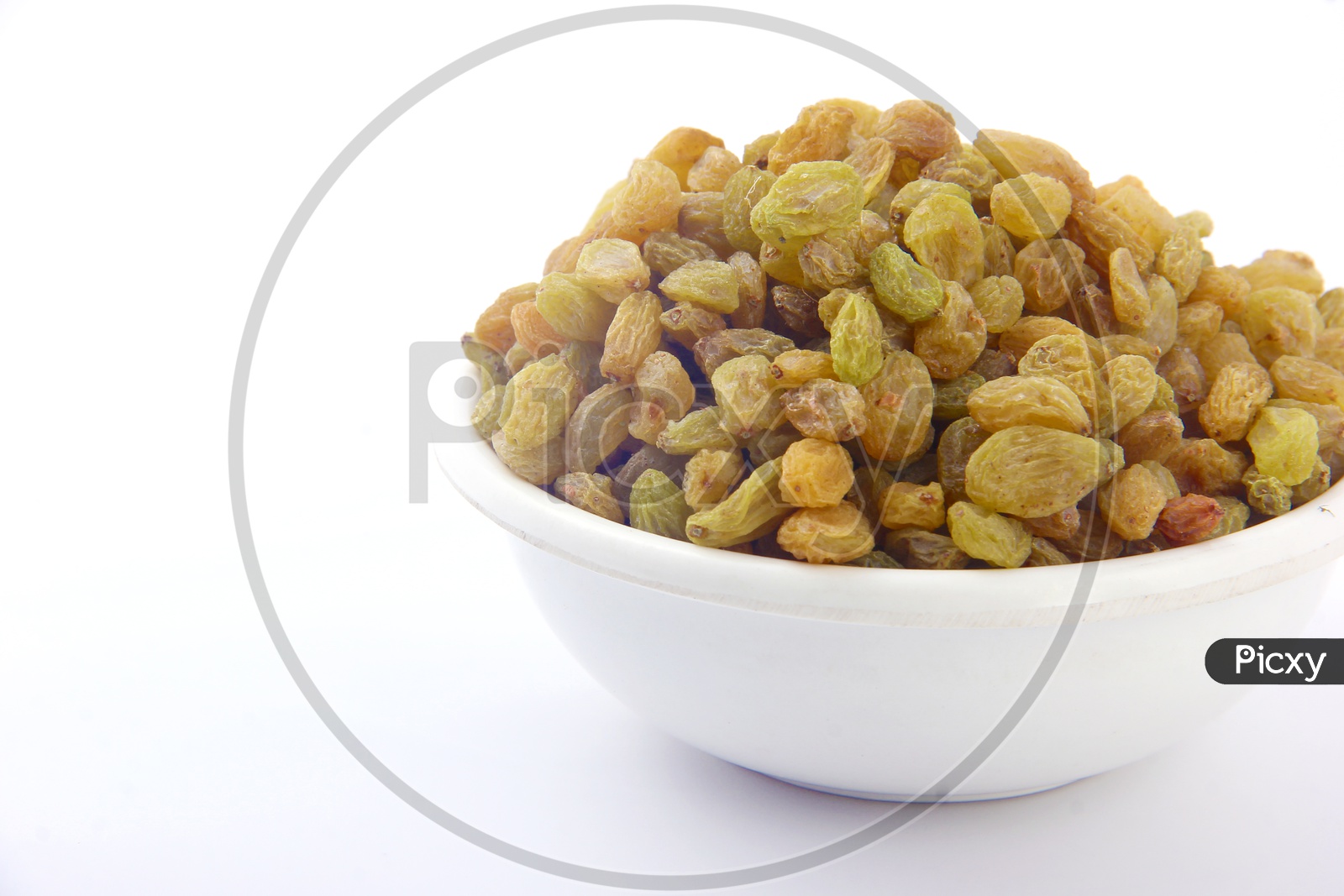 Bowl of Raisins / raisins in a Bowl with Raisins in Background