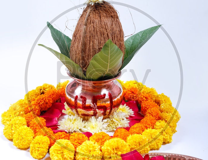 Kalisam decorated with Marigold Flower for Pooja & Thalli. Indian traditions/rituals