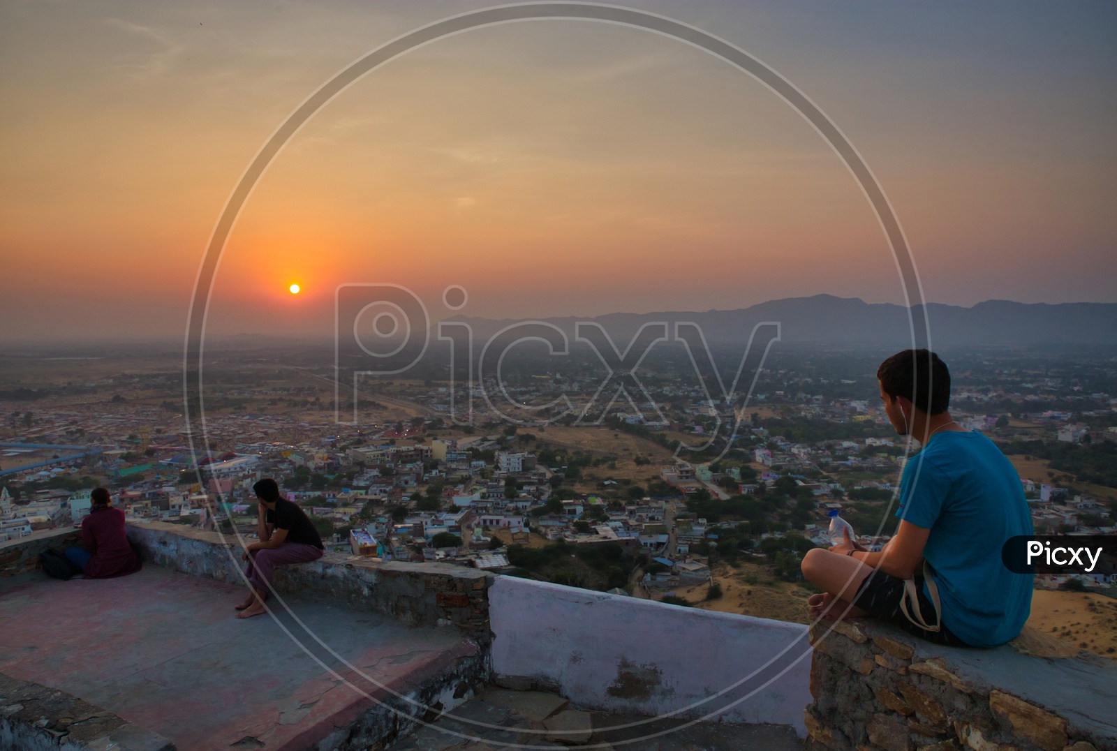 Foreigner watching sunset at Pushkar