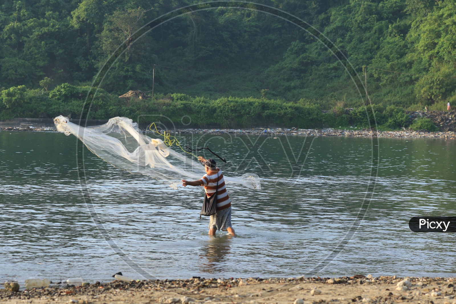 Fisherman Fishing along the Port Blair, Andaman and Nicobar Islands