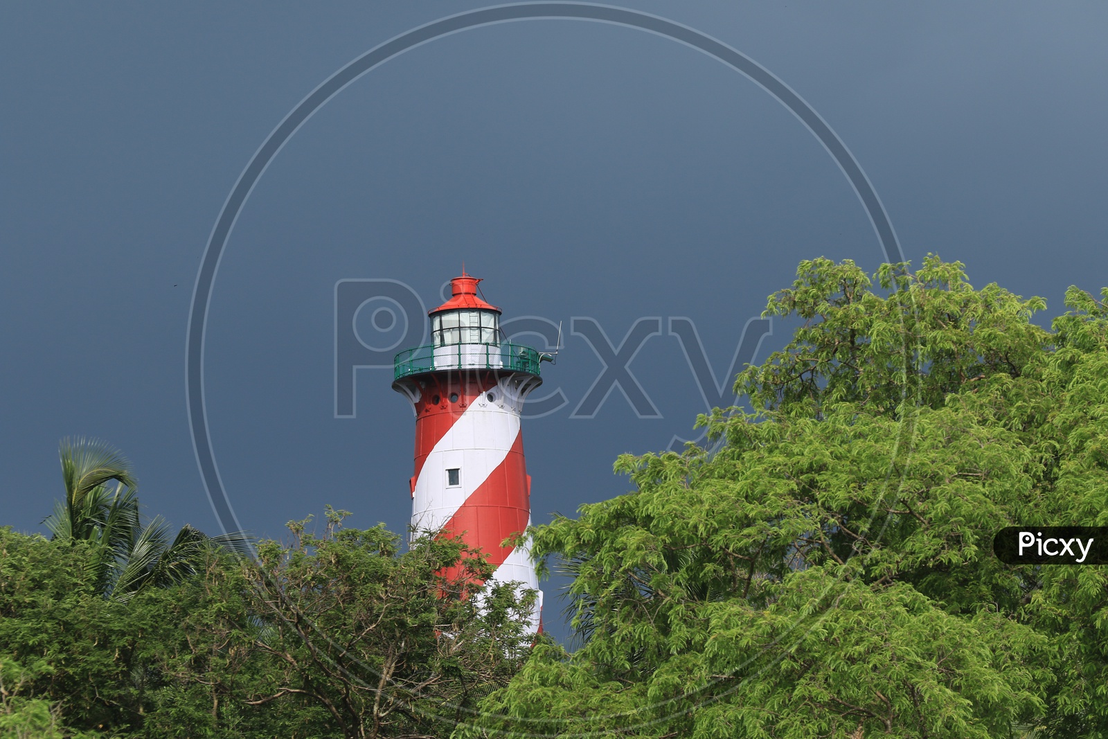 Light house between the trees in Port Blair