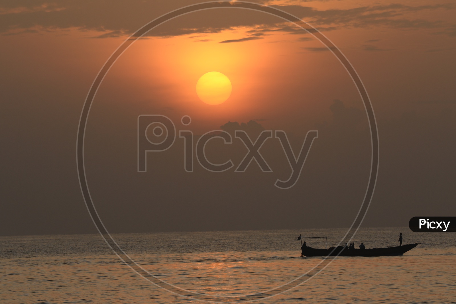 Sunset/Sunrise with boat along the Bay of Bengal Sea