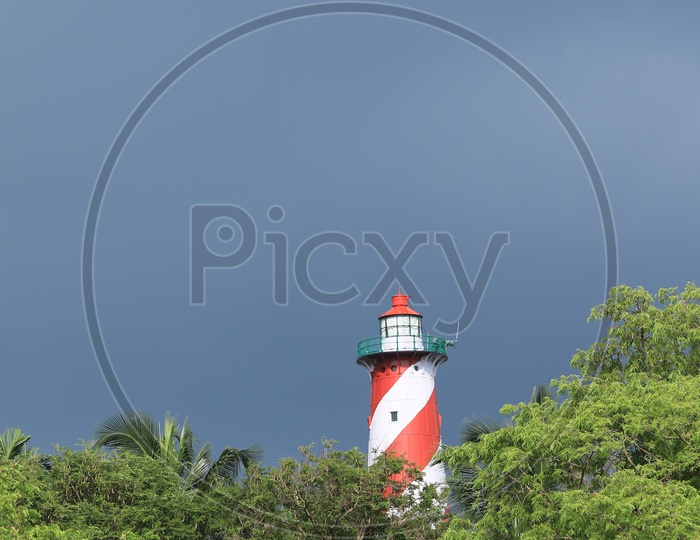Light house between the trees in Port Blair
