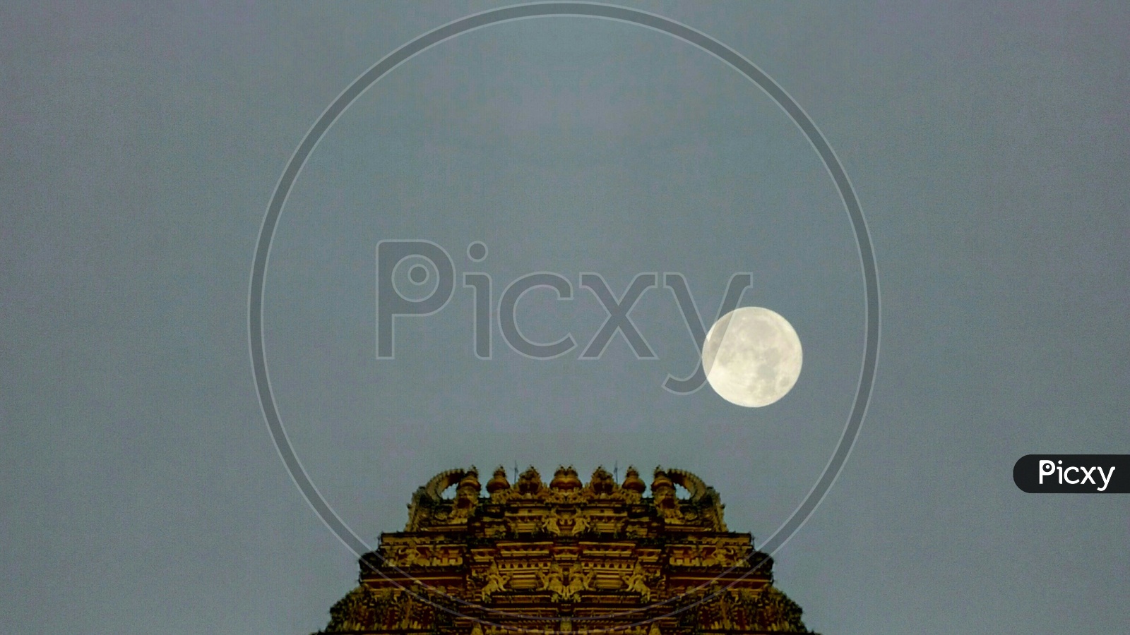 Mysore temple Gopuram with a Full moon in the background