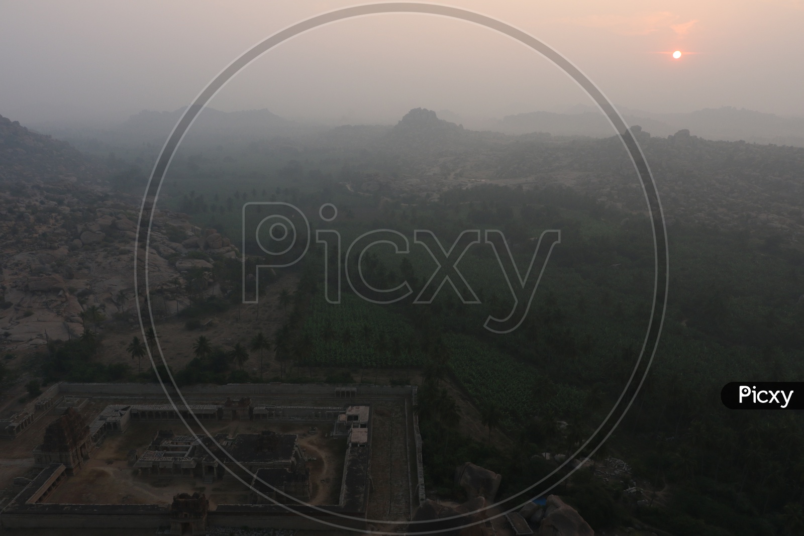 Achyuta Raya Temple in aerial view with sunrise