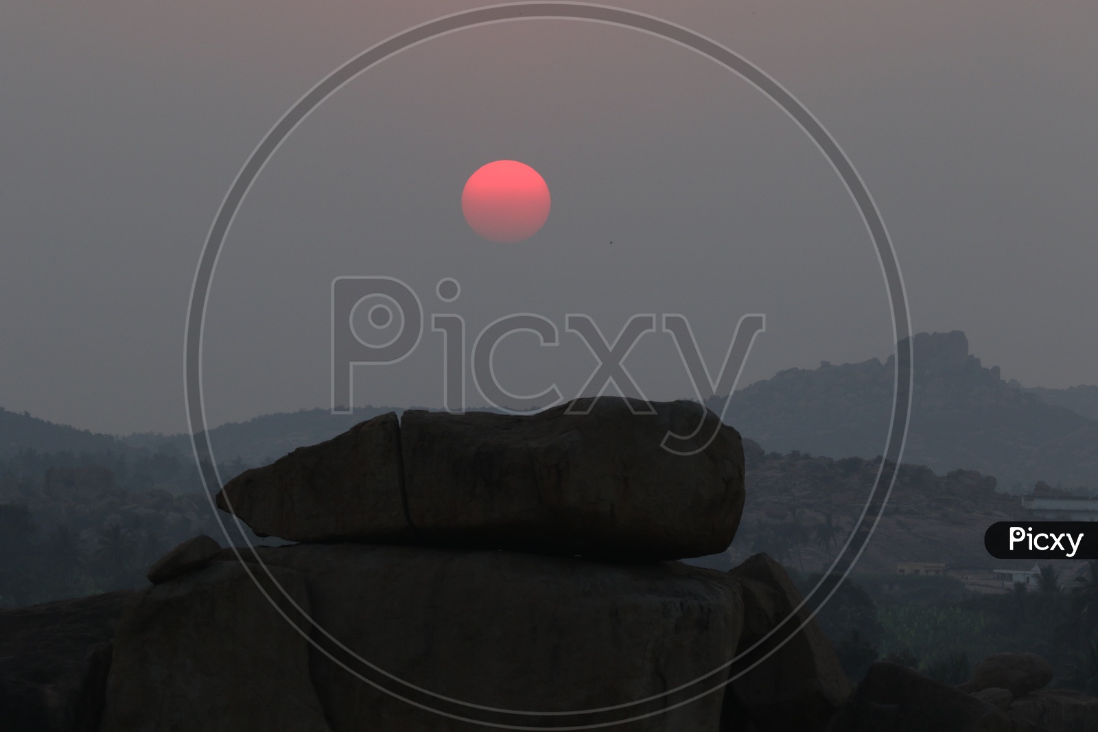 A Sunset over The Rock Hills in Hampi , Karnataka