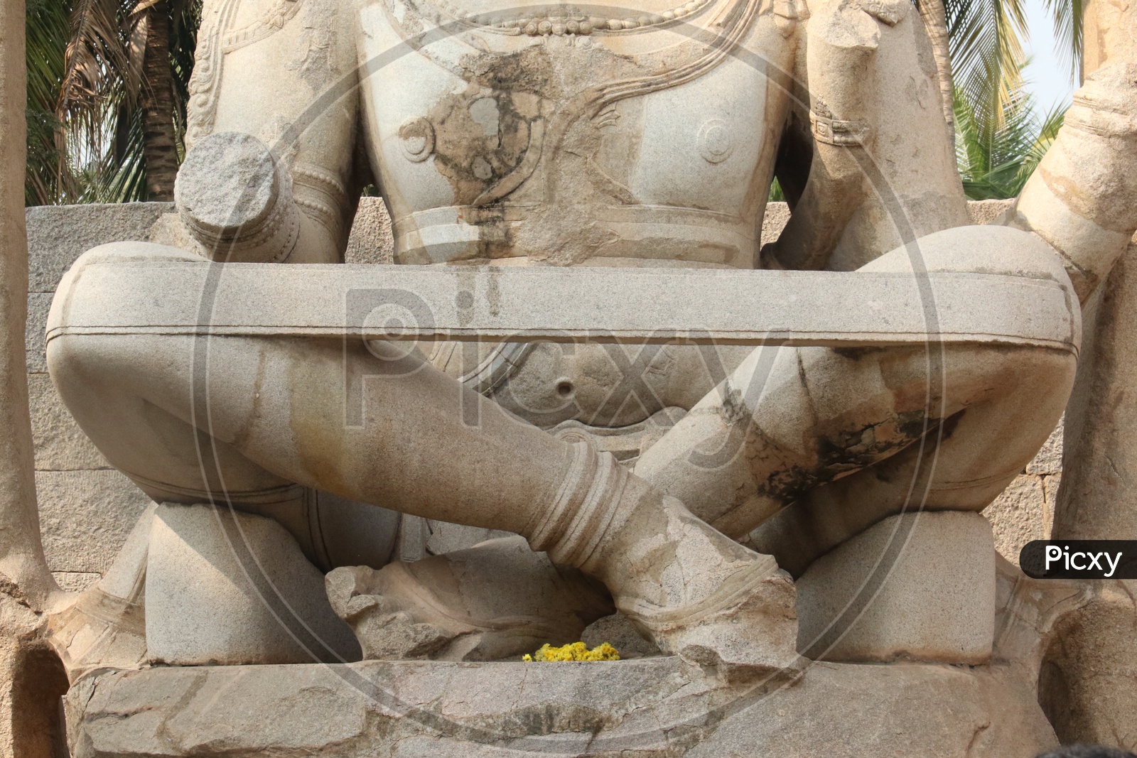 The Old Ruins Of Stone sculpture Of Hindu God Lakshmi Narasimha swamy at Sri Lakshmi Narasimha Temple in Hampi , karnataka