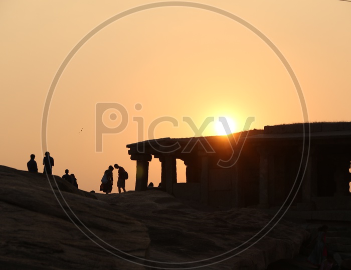 Tourists /  Visitors at a Sunset Point in Hampi