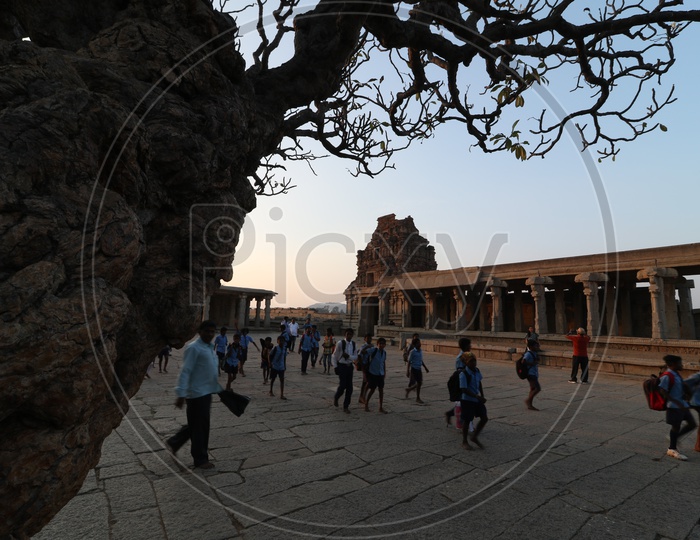 Vittala Temple Shrine and Visitors In an Blue Hour in Hampi , Karnataka