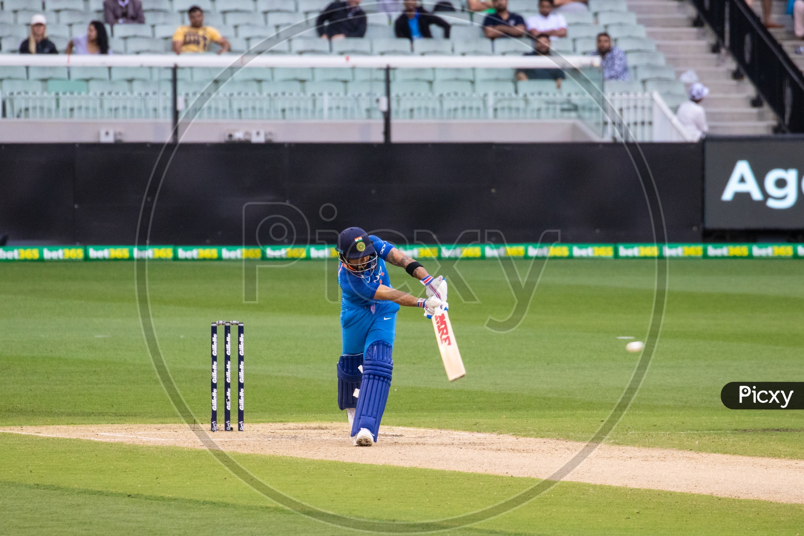 Indian Cricket Team Captain Virat Kohli Playing a Shot In a Match