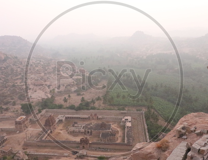 Achyuta Raya Temple in Aerial View with mountains in the Background
