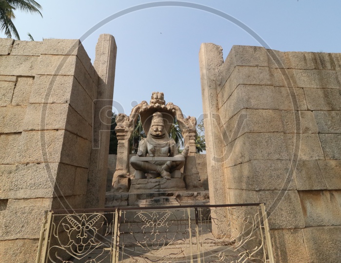 Stone sculpture Of Hindu God Lakshmi Narasimha swamy at Sri Lakshmi Narasimha Temple in Hampi , karnataka