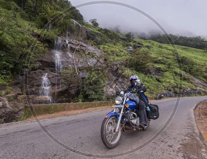 Traveller riding bike on karnataka roads