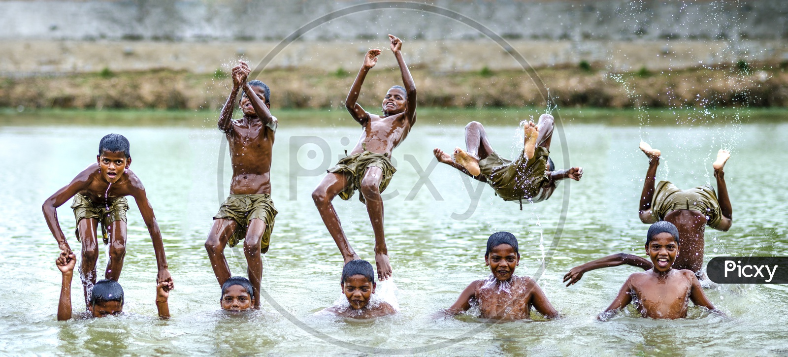 Boys jumping in the water