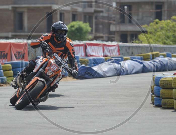 Riders Riding KTM Bikes on Tracks At Orange Day KTM Event in Chennai