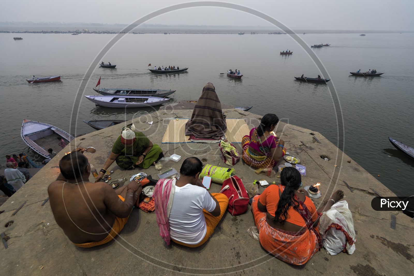Indian hindu Devotees  Paying Holy Puja For River ganga  in varanasi