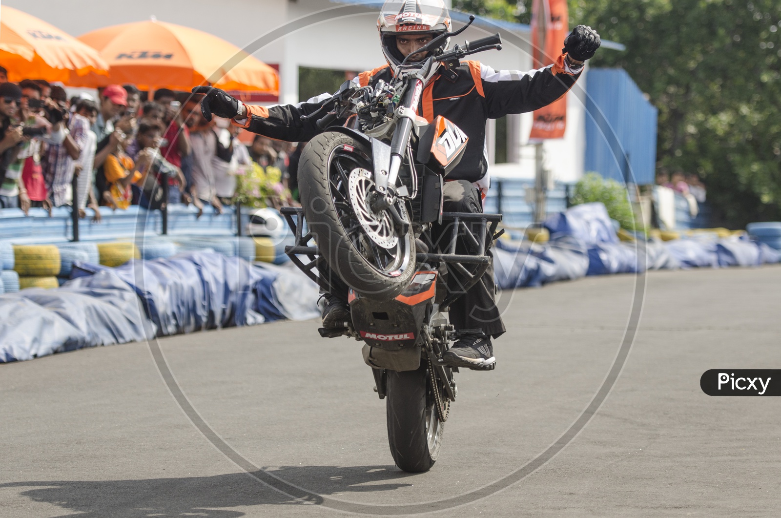 Bikers Performing Stunts at Orange Day KTM Event in Chennai